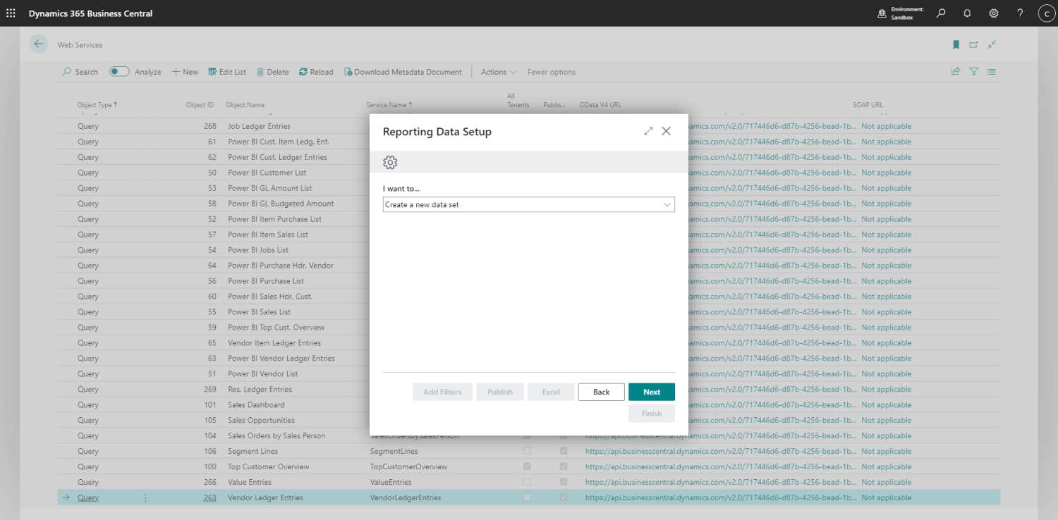 Screenshot of a "Reporting Data Setup" dialog box in Dynamics 365 Business Central, overlaying a list of web services. The dialog offers system integrators options to create a new data set, ensuring seamless integration and efficient data handling.