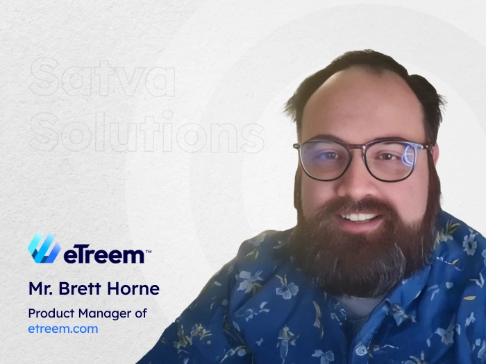 Brett Horne, Product Manager at eTreem, wearing glasses and a blue floral shirt in a testimonial for Satva Solutions.