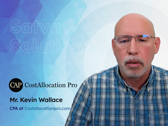 Kevin Wallace, CPA at CostAllocationPro, wearing a plaid shirt and glasses, sharing his experience with Satva Solutions.